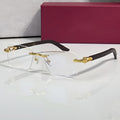 Rimless buffs Glasses, clear lenses, Cartier eyewear