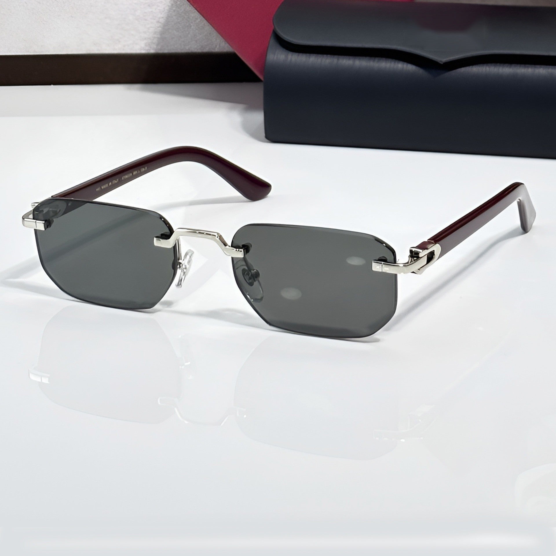 Rimless buffs Sunglasses, solid grey lenses, Cartier eyewear