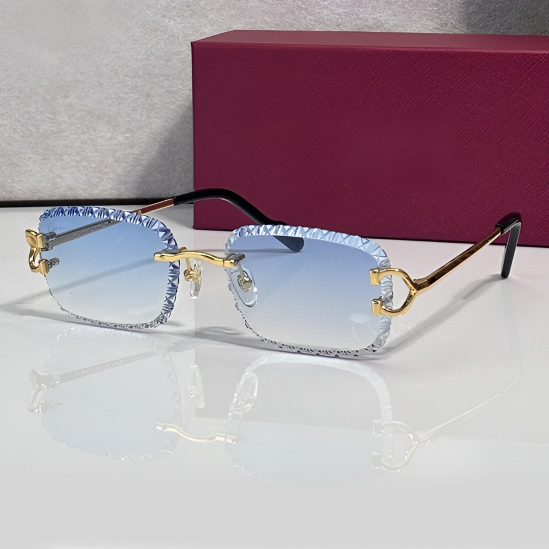 Iced out C wire glasses, blue gradient lenses, Cartier eyewear